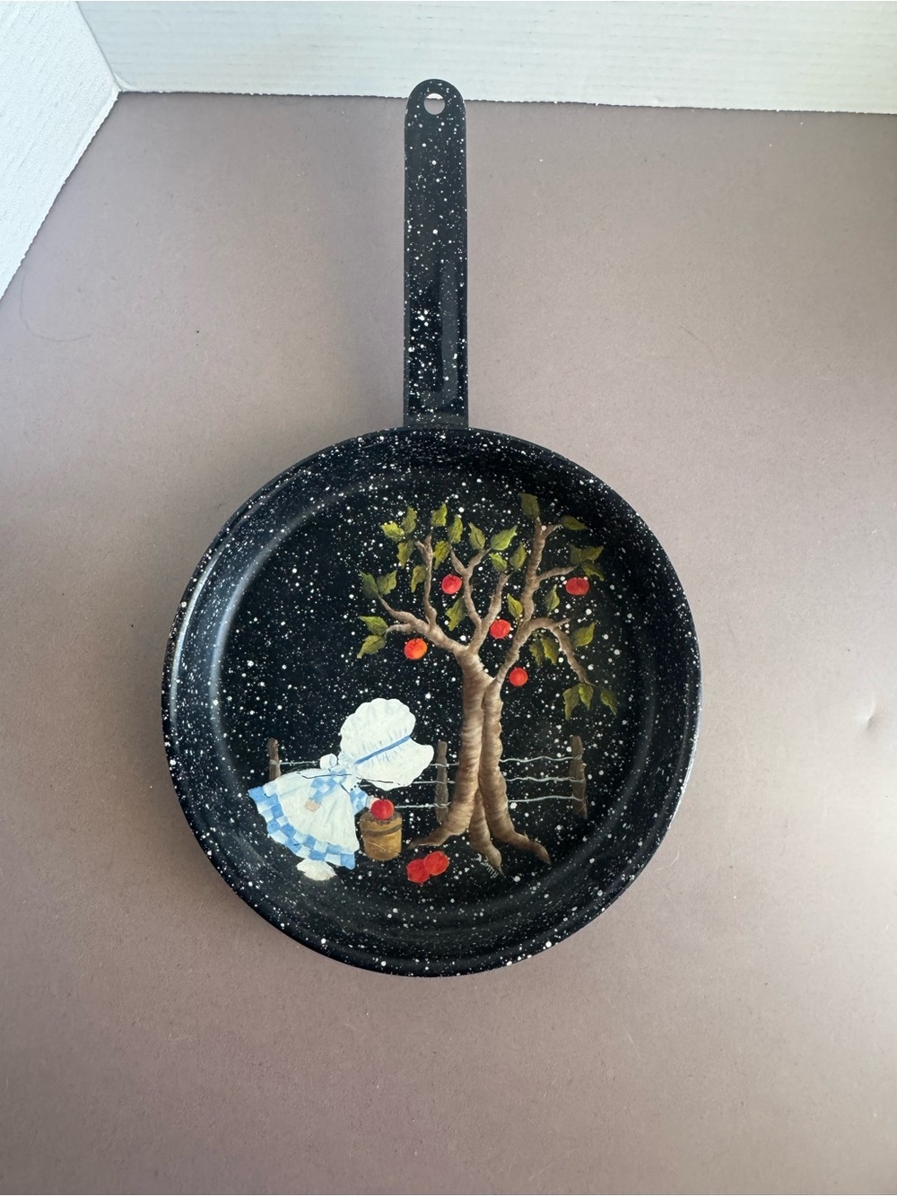 Hand-Painted Black Speckled Skillet Wall Decor with Girl and Apple Tree